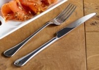 Slim Premium Table Knife & Fork in use.